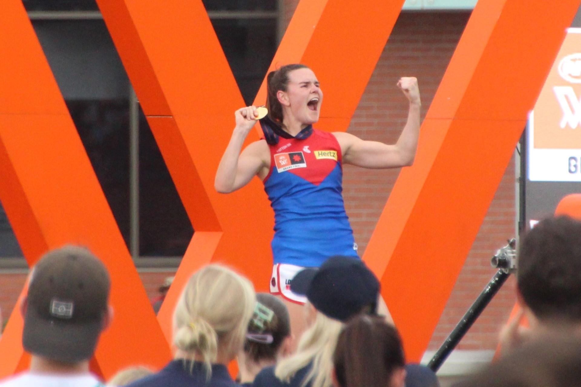 Lily Mithen celebrates after the AFL Women's season seven Grand Final at Springfield Central Stadium in Ipswich, Queensland.