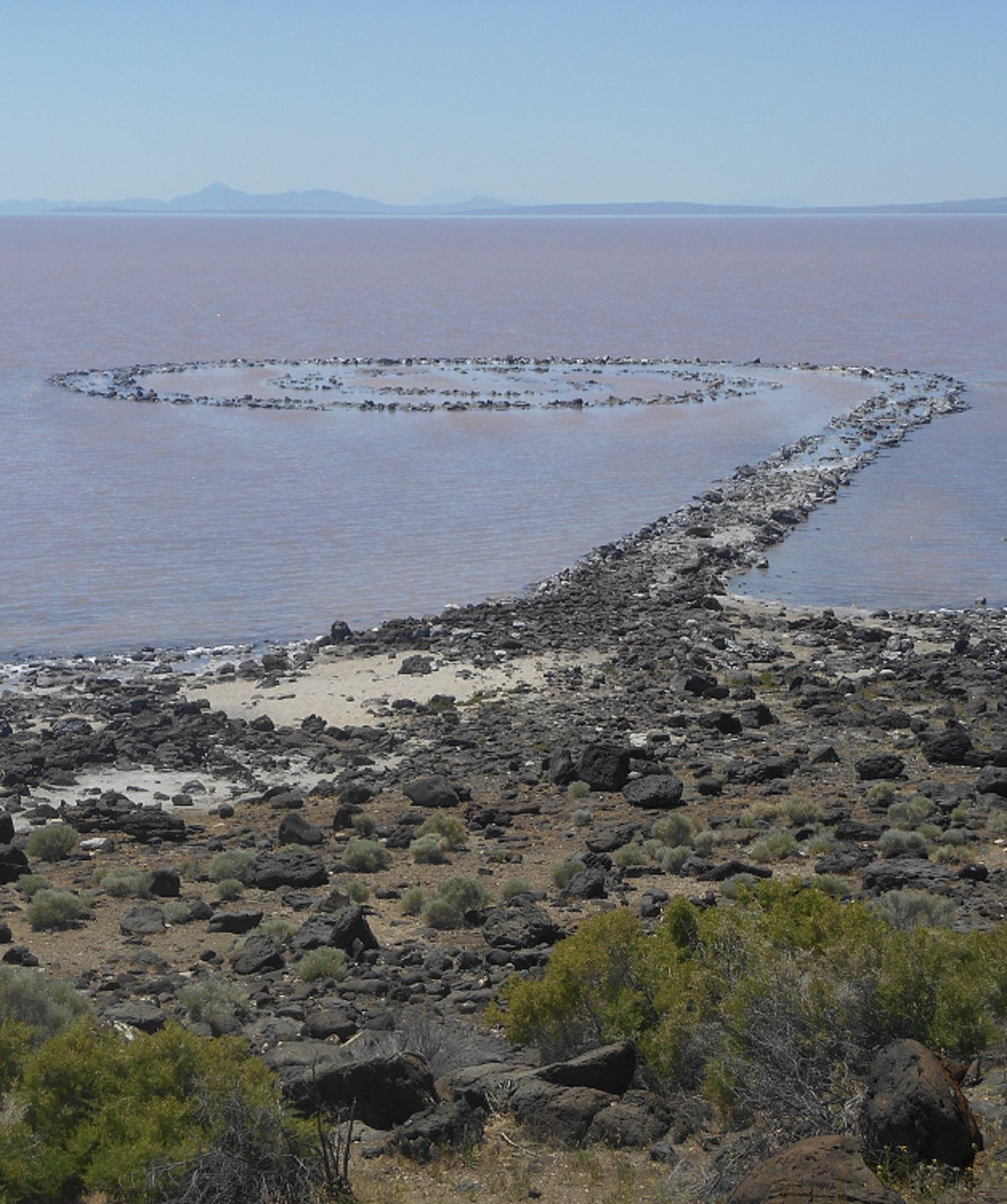 A land sculpture under a hazy sky. 