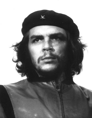 A greyscale image of a man wearing a beret.