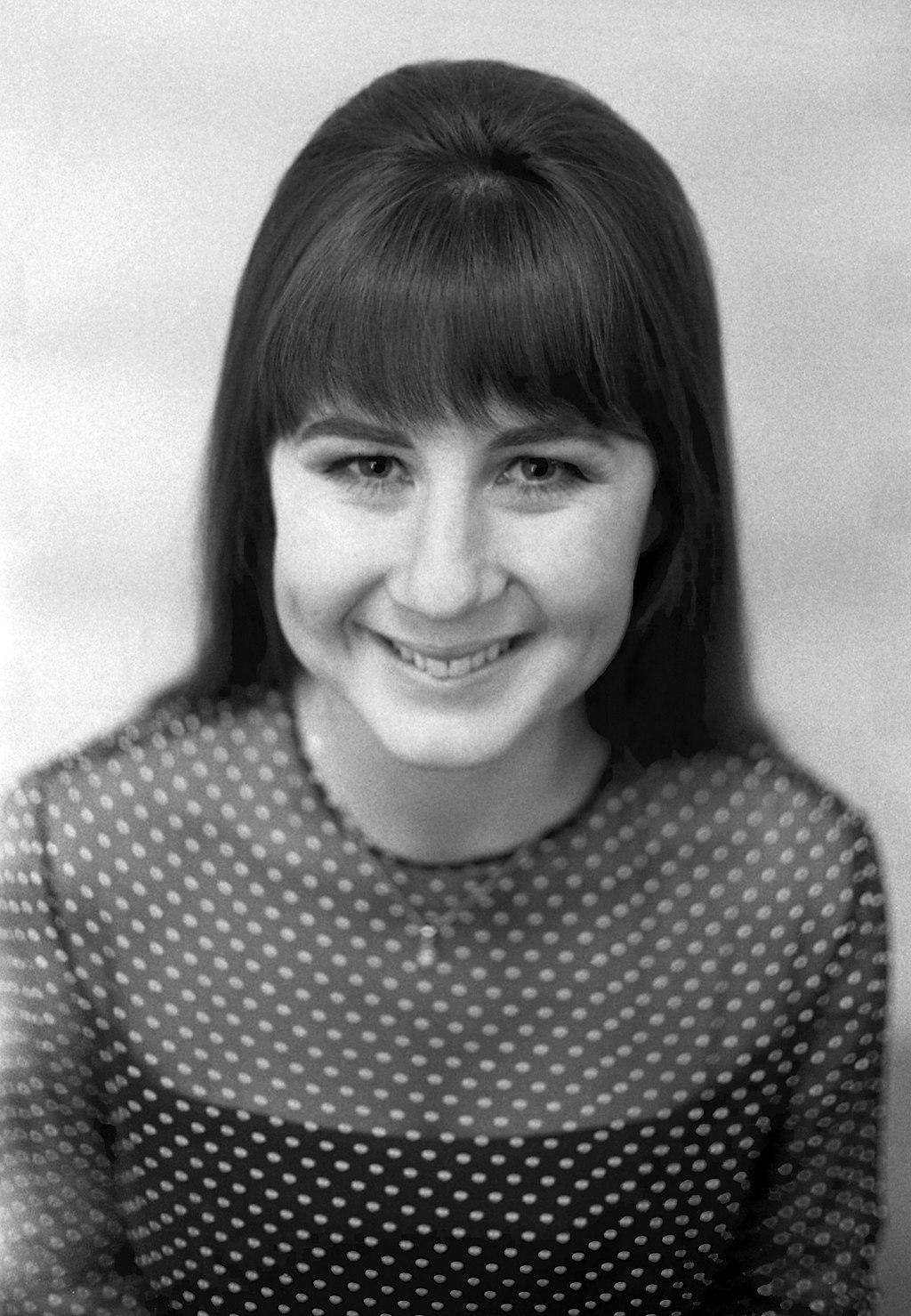 Black and white photo of Judith Durham smiling