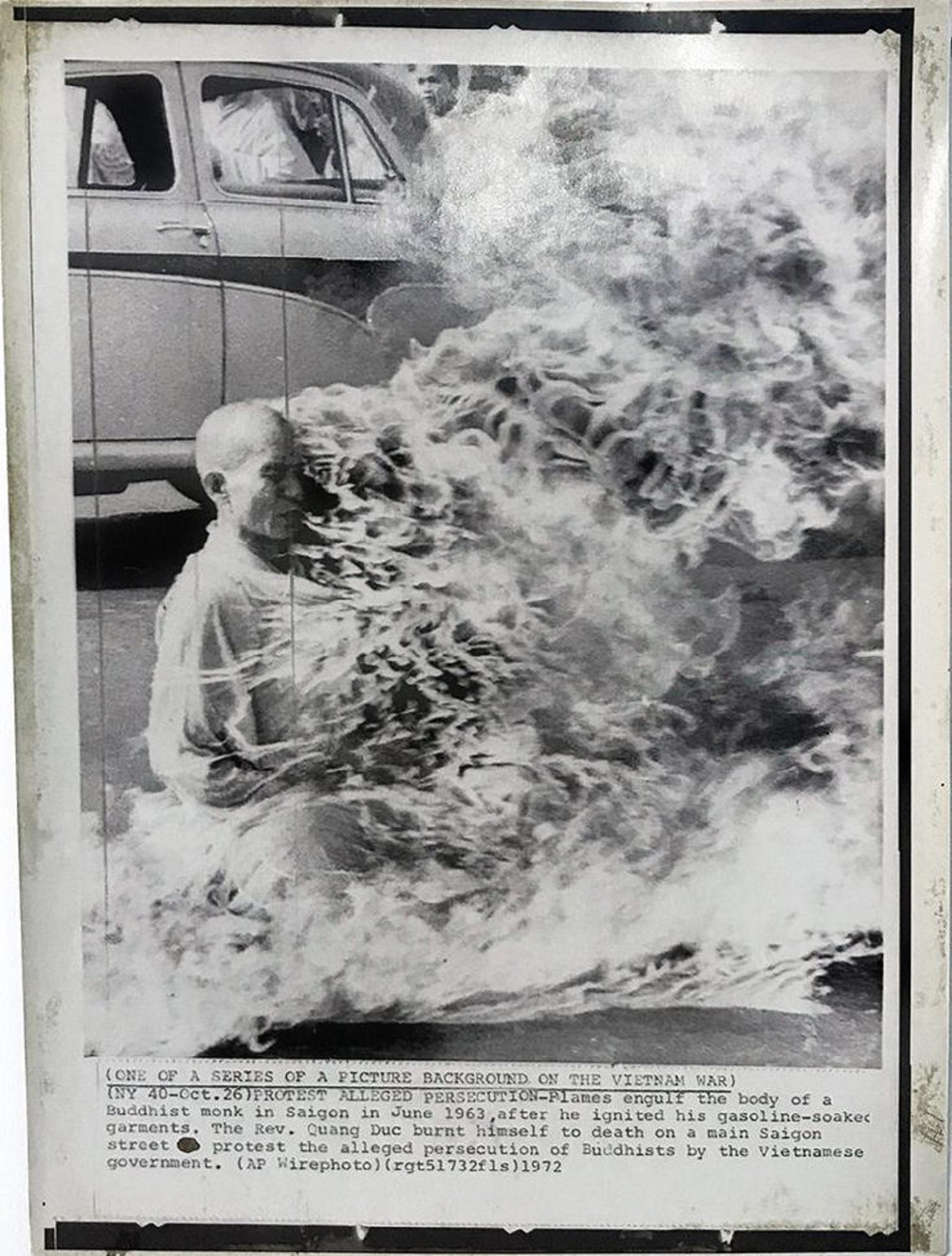 A greyscale image of a man self-immolating.