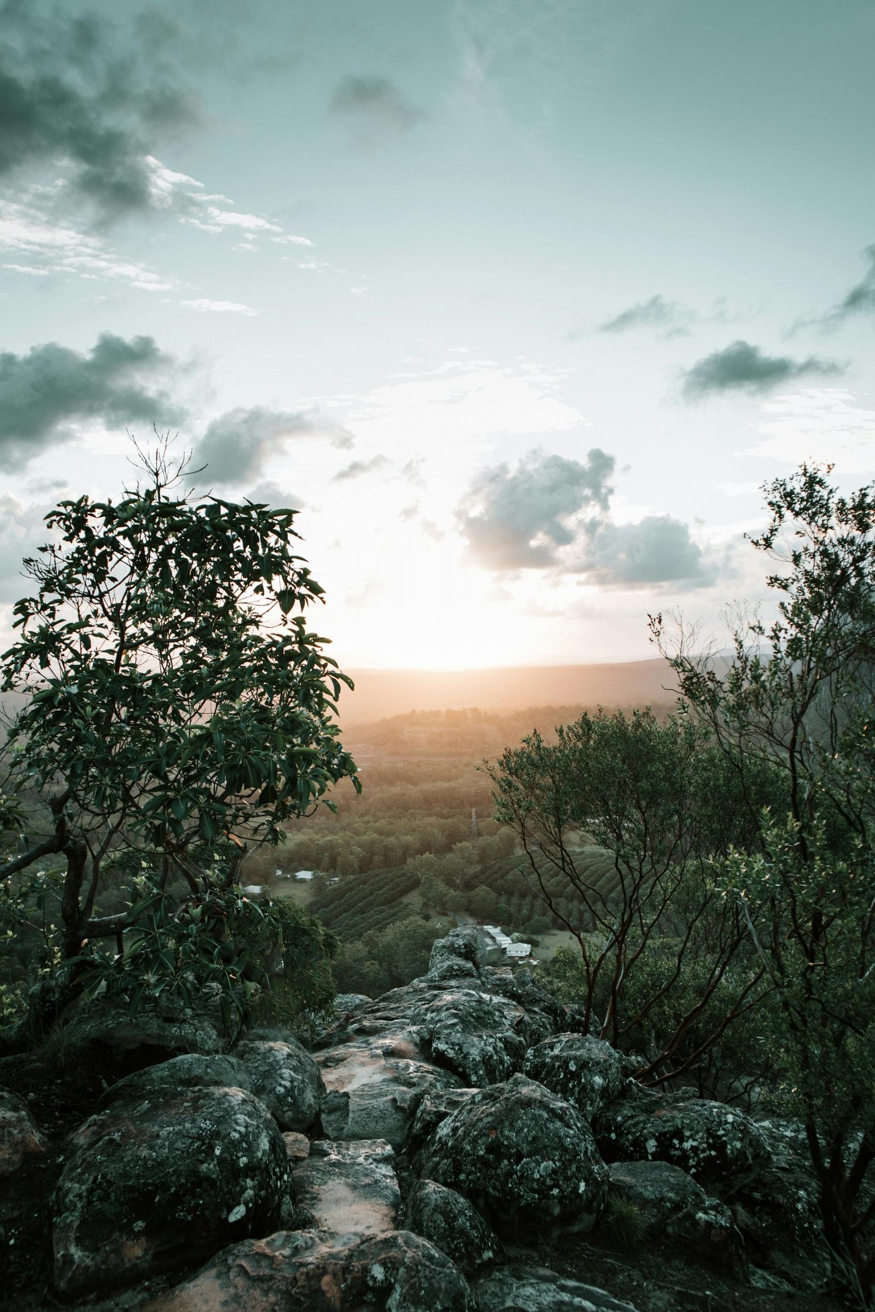 The view from atop a mountain at sunrise. 