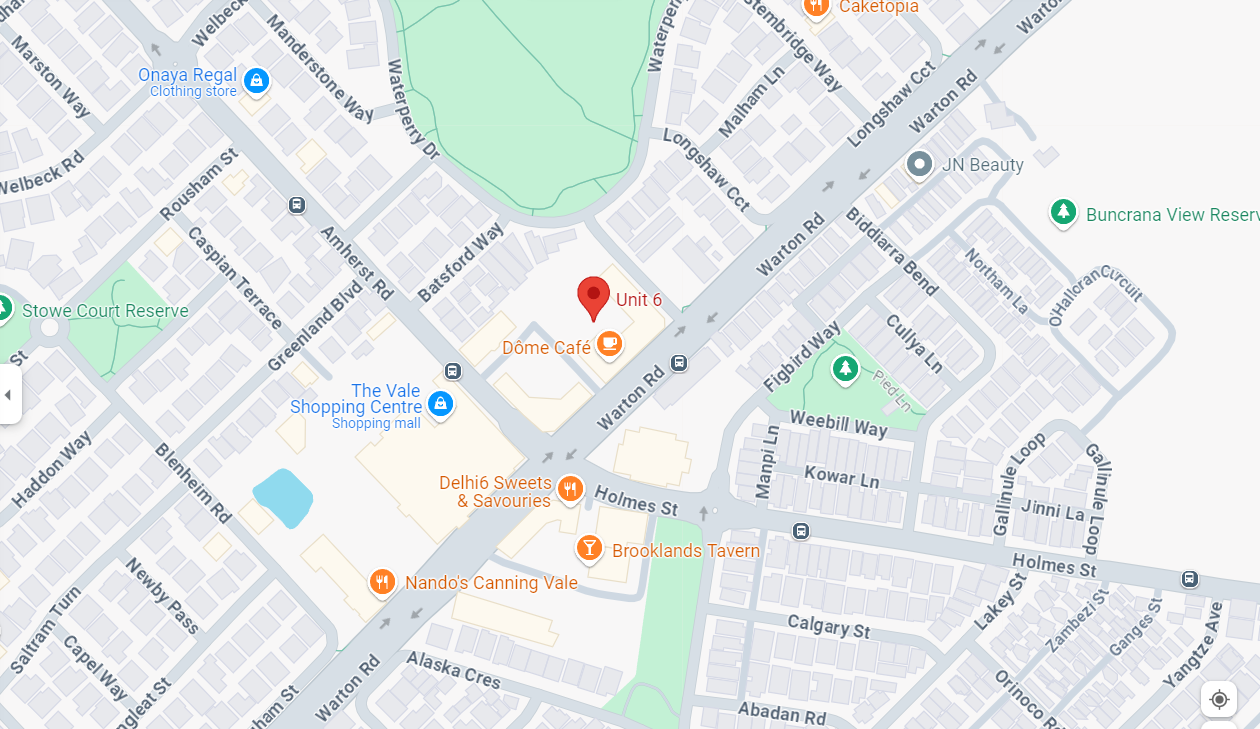A city map with a red marker in the middle of it.