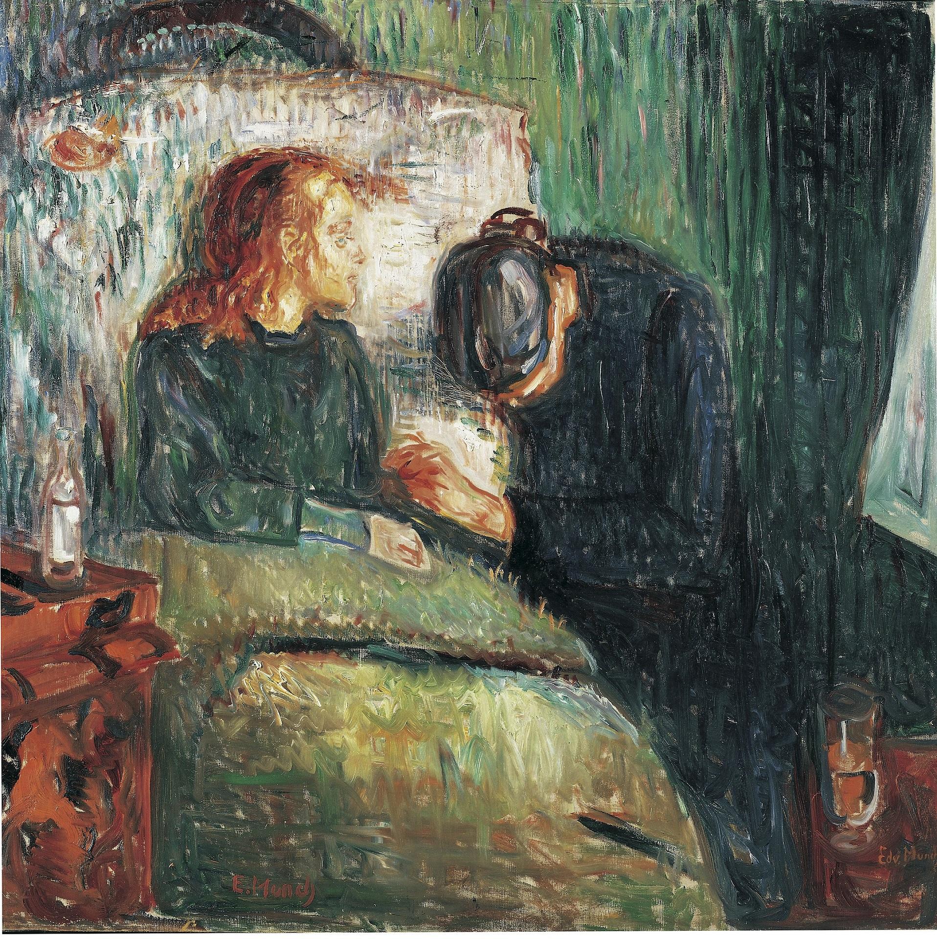 A person with red hair reclines in bed with a woman in black next to them in a chair.
