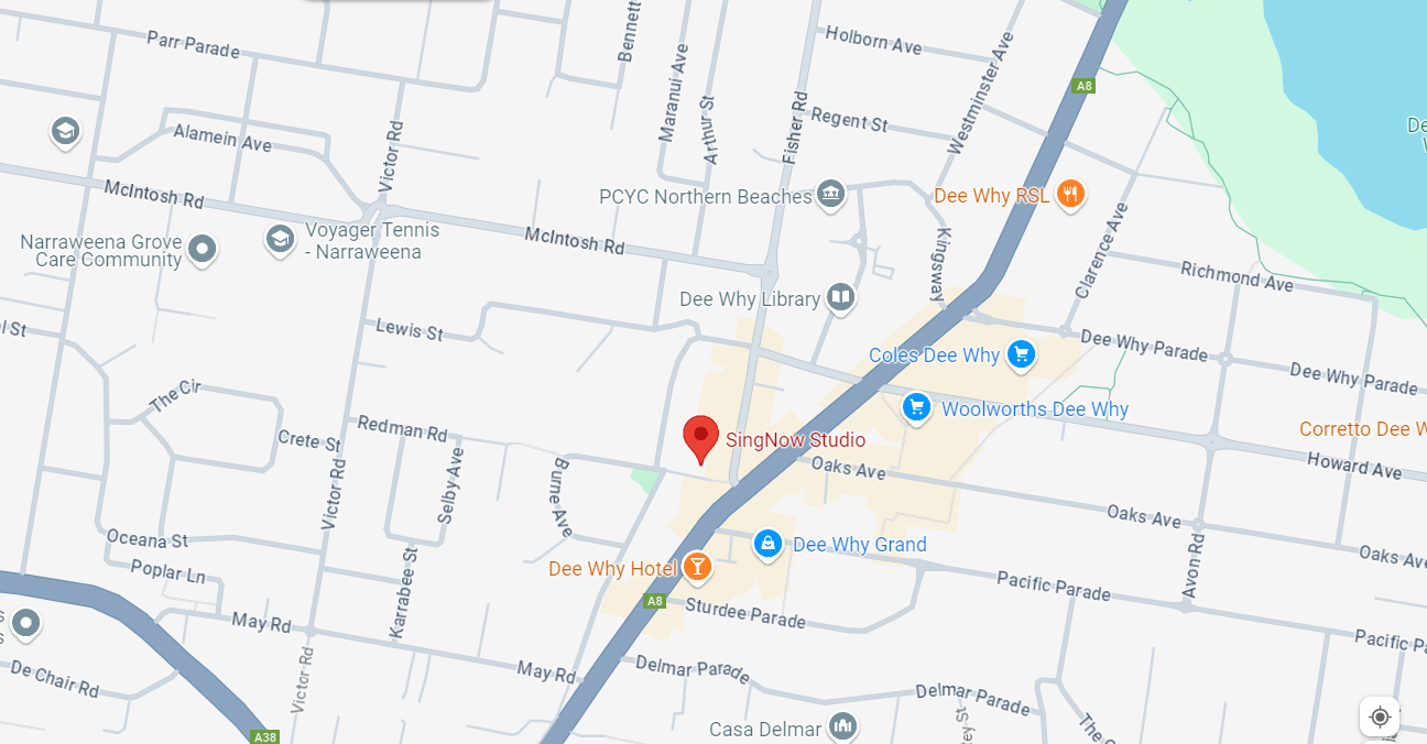 A map closeup that shows a major road and a business highlighted with a red pin. 