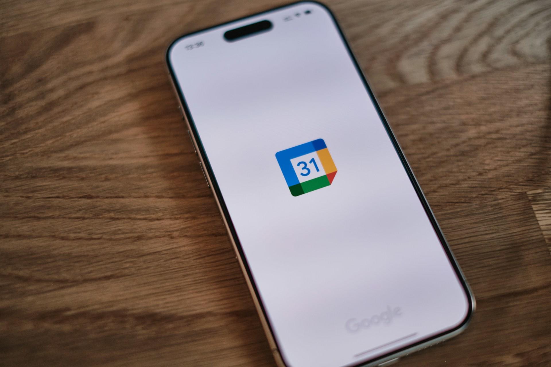 A smartphone with the Google Calendar app.