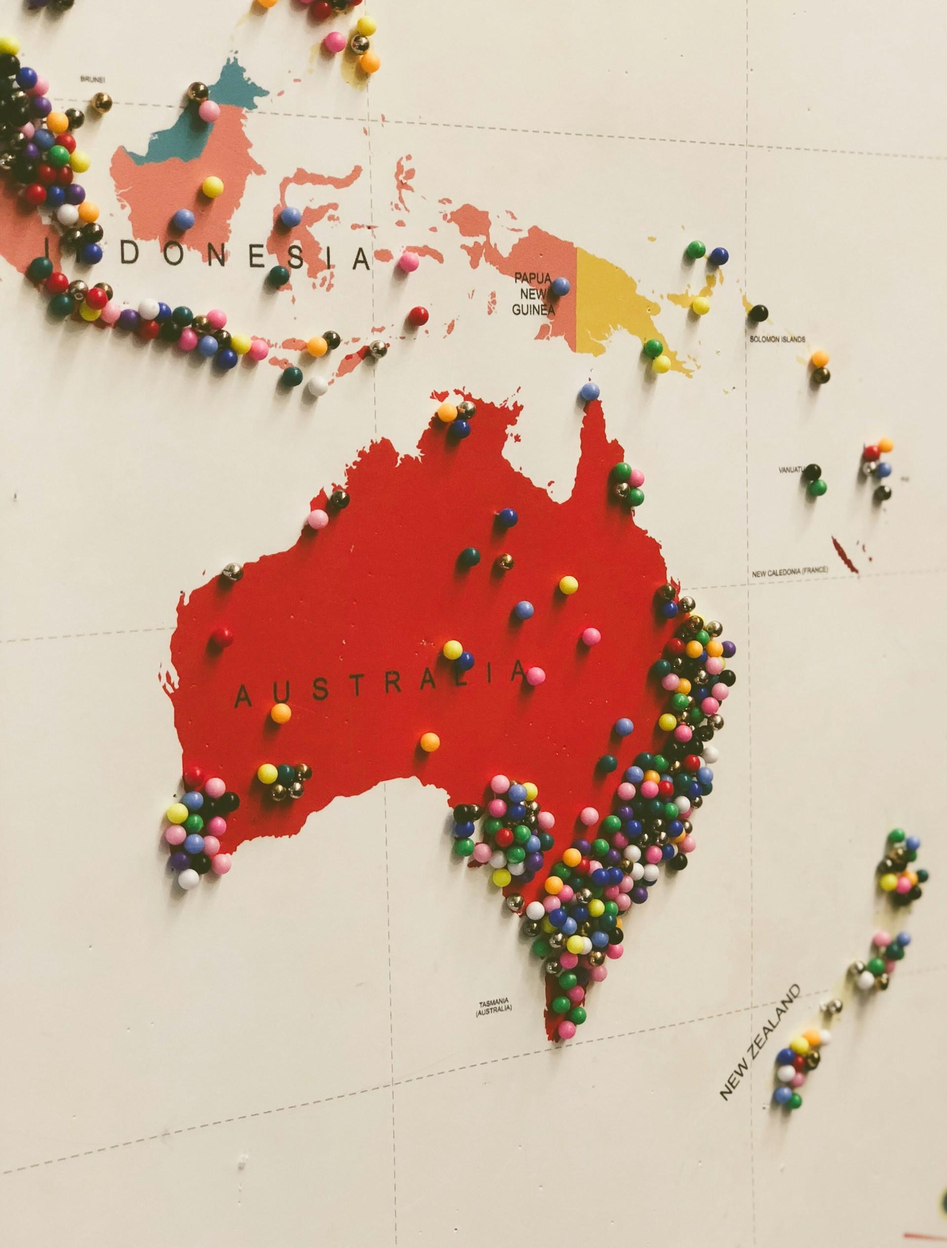 A map of Australia coloured red, with many stickpins along its coasts. 