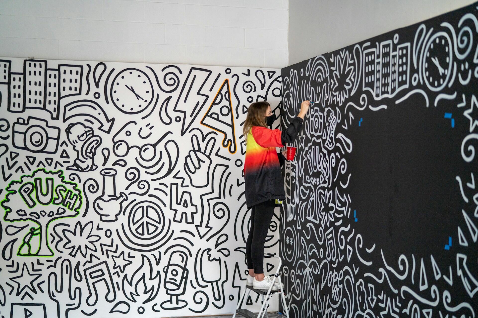 An artist working on an exhibition piece.