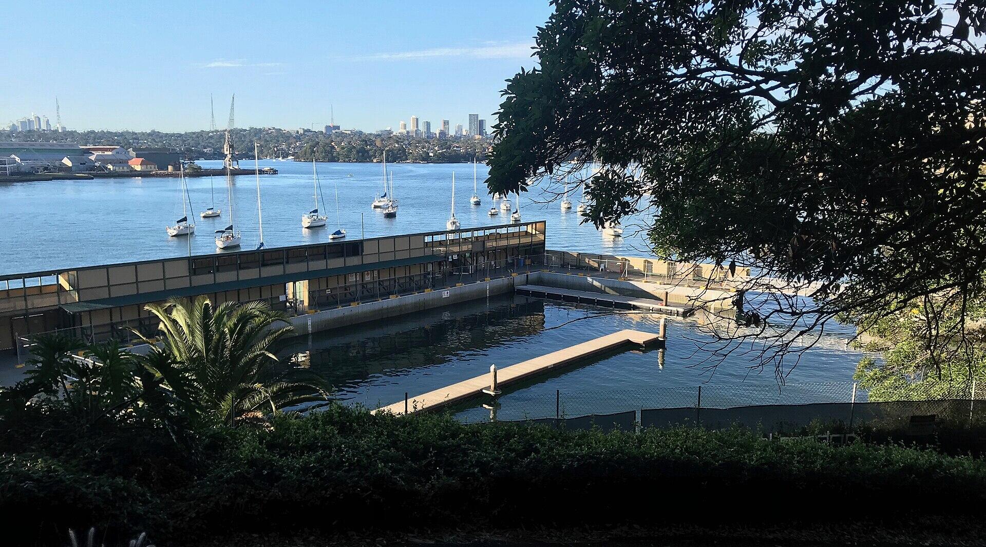 A tidal pool seen from a hilltop on a sunny day.