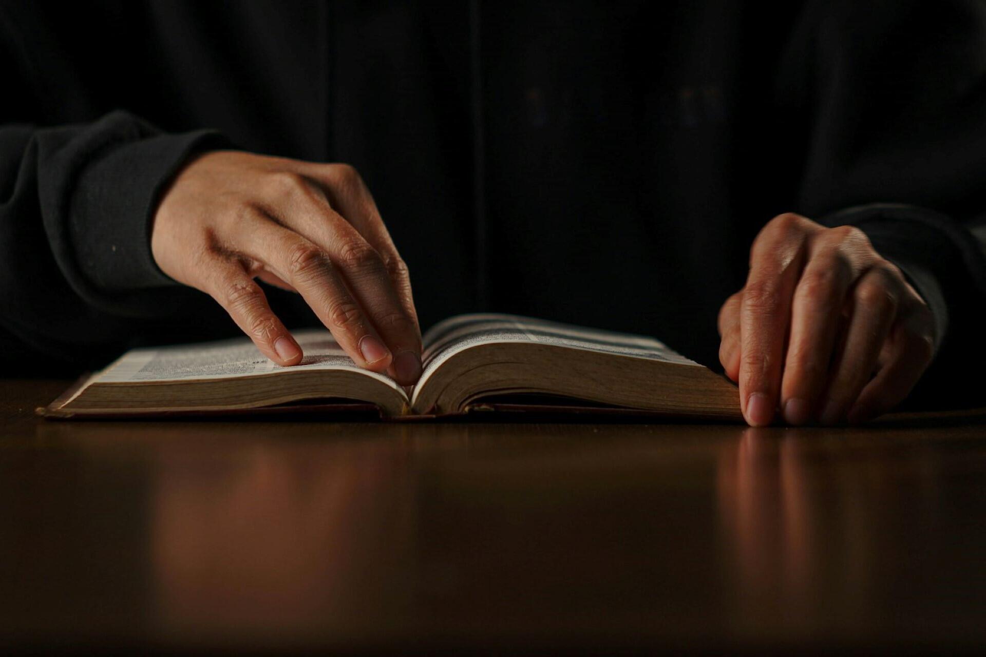 A person reading a book.