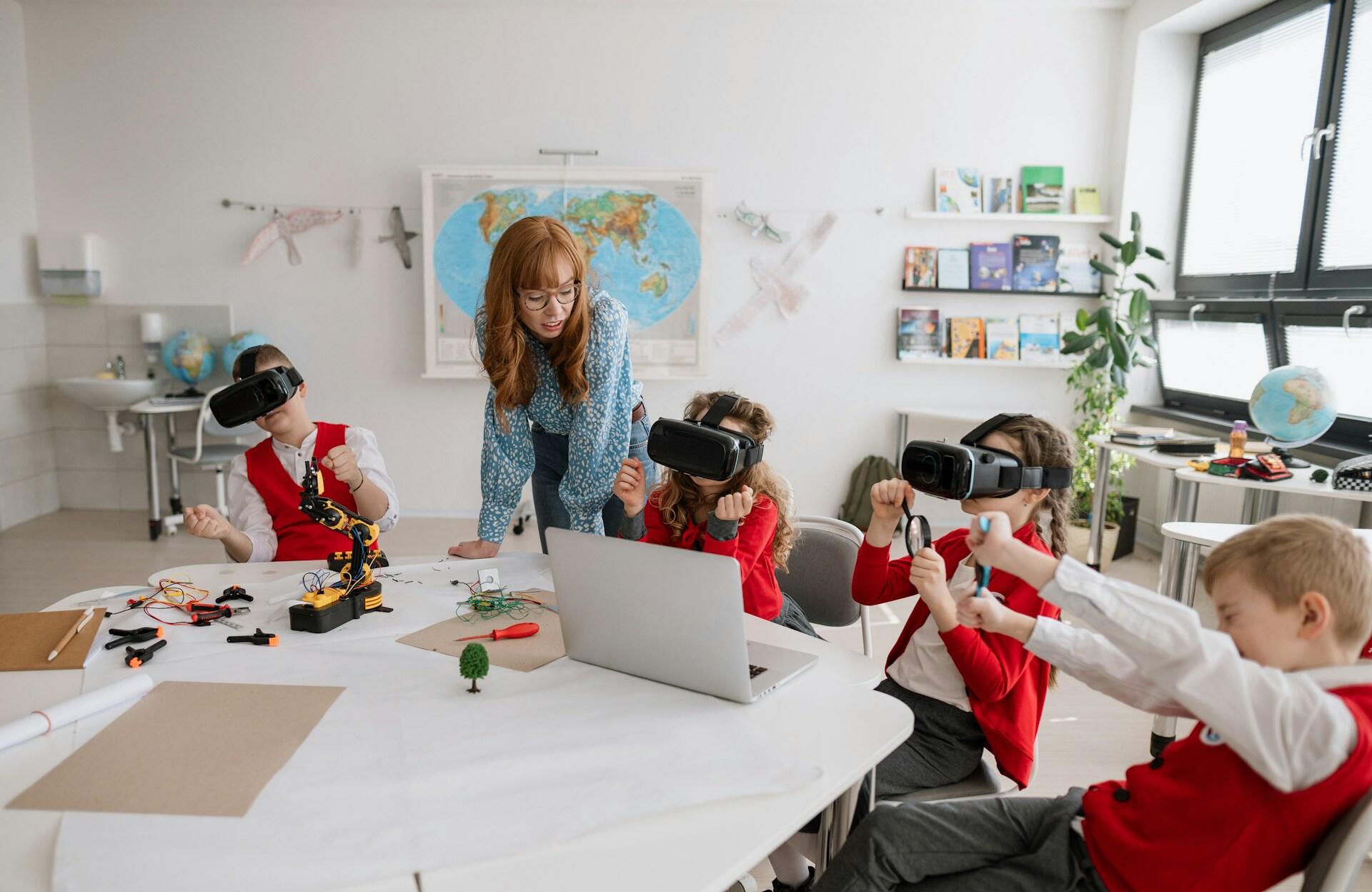 Students in a classroom with VR headsets. 
