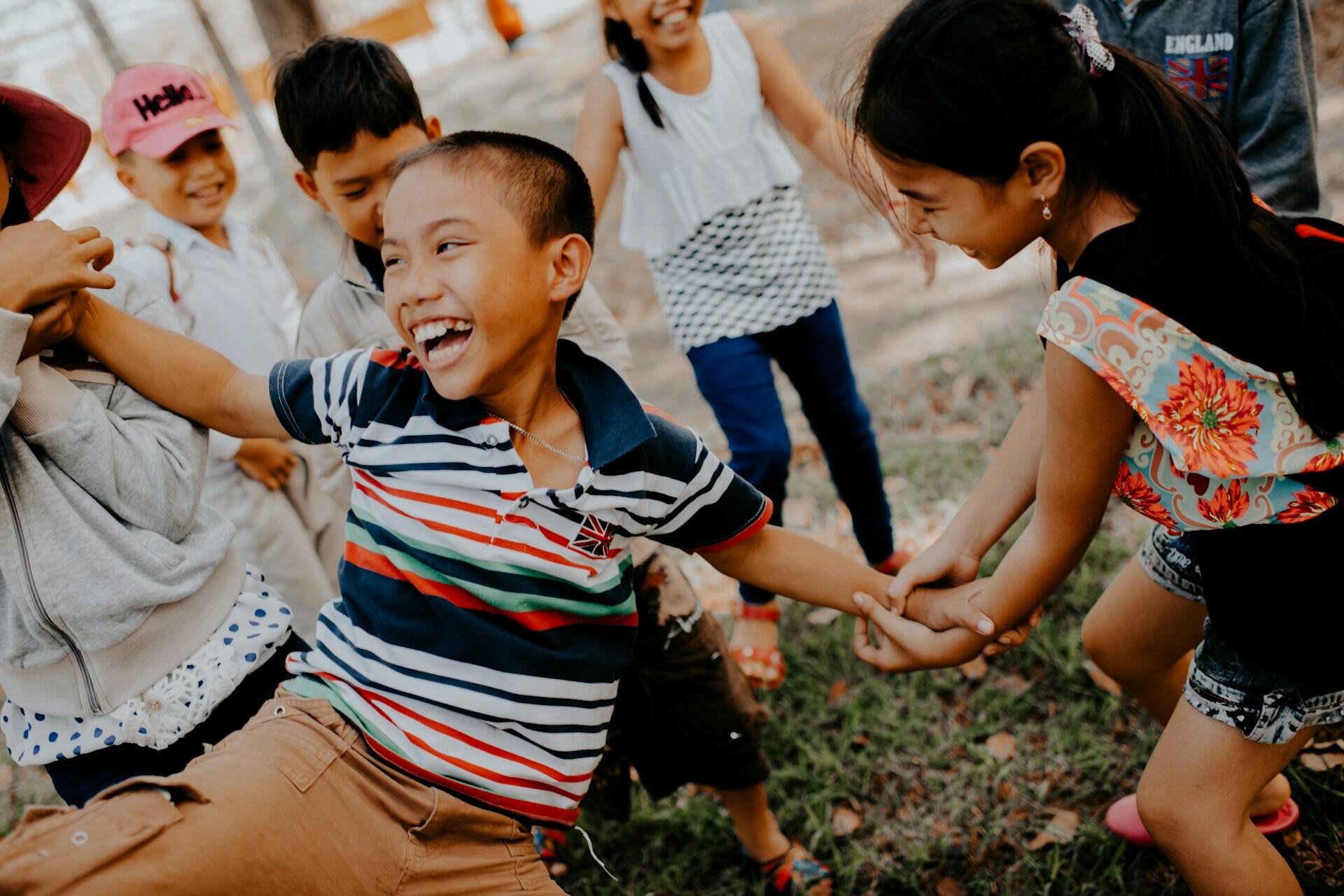 Children playing and laughing. 