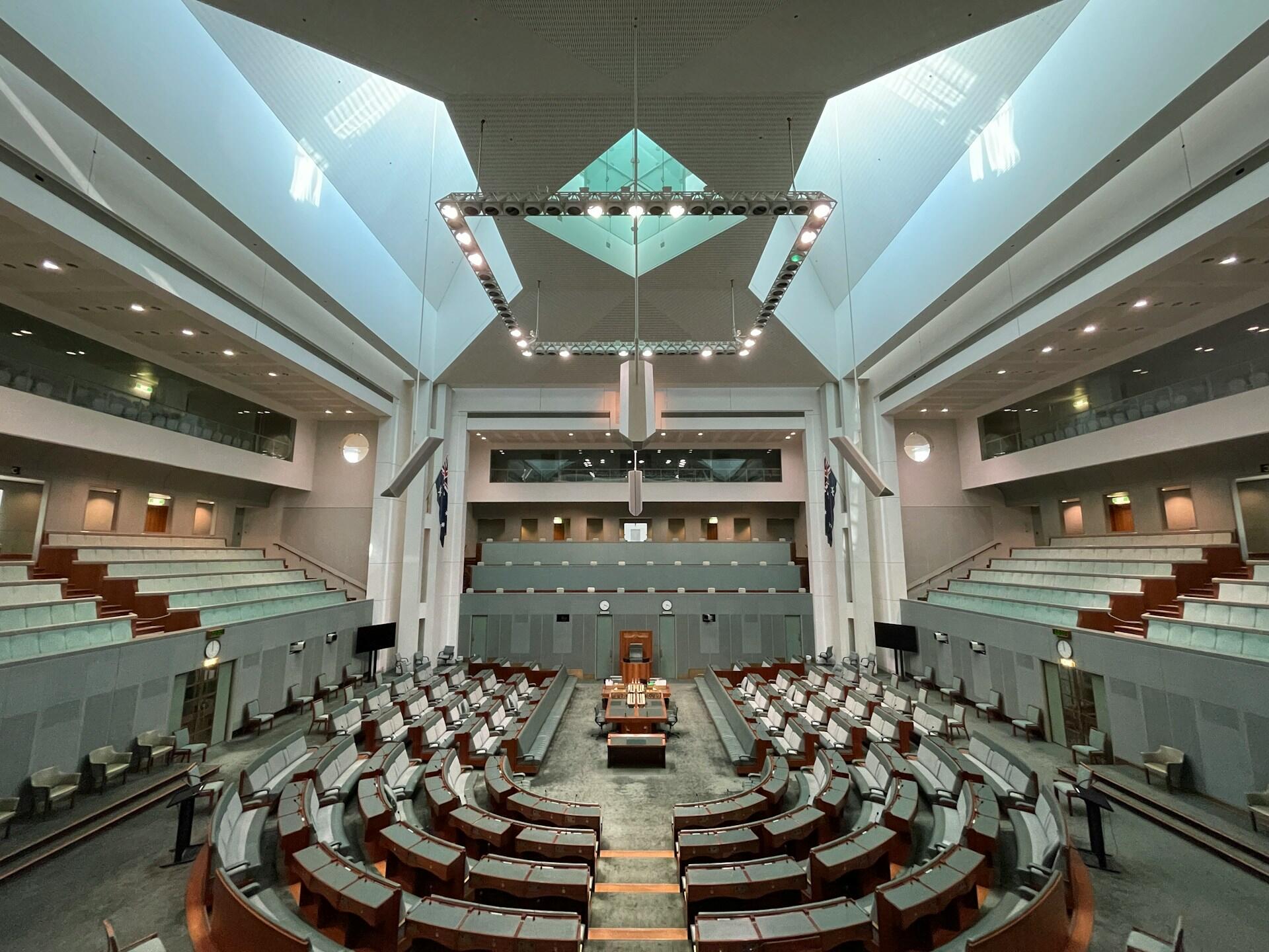 A large salle with wood and green accents.