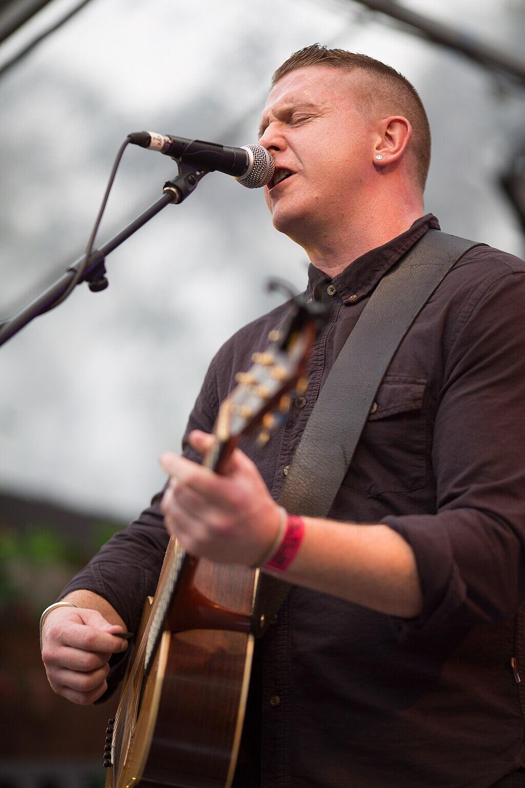 Irish Singer Damien Dempsey performs on stage.