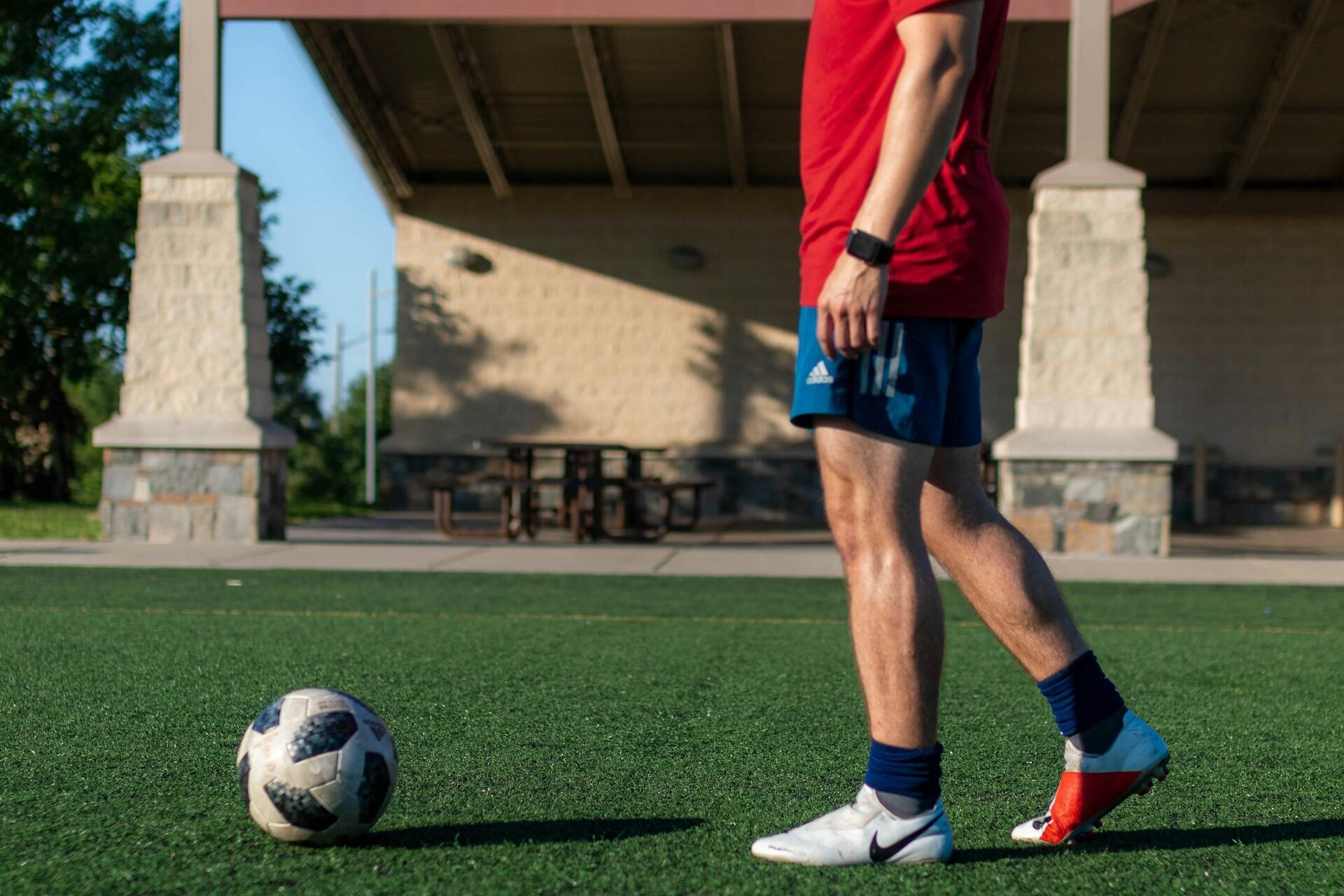 A football player on a training pitch.