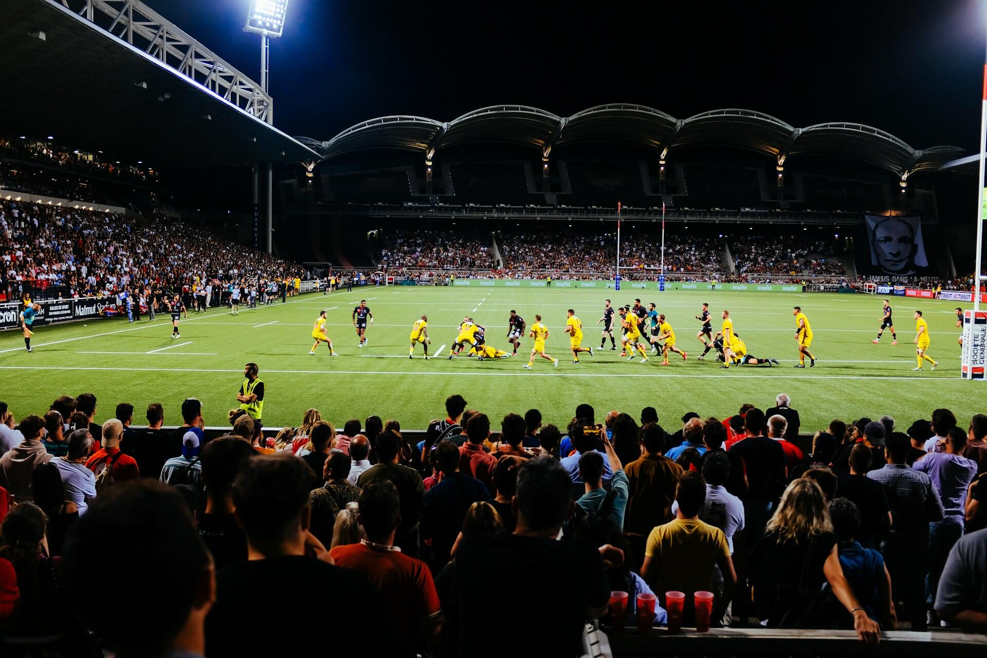 A rugby stadium during a match.