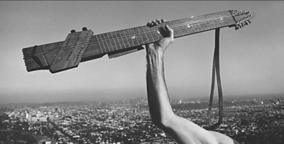  Learn to play the guitar with one hand.