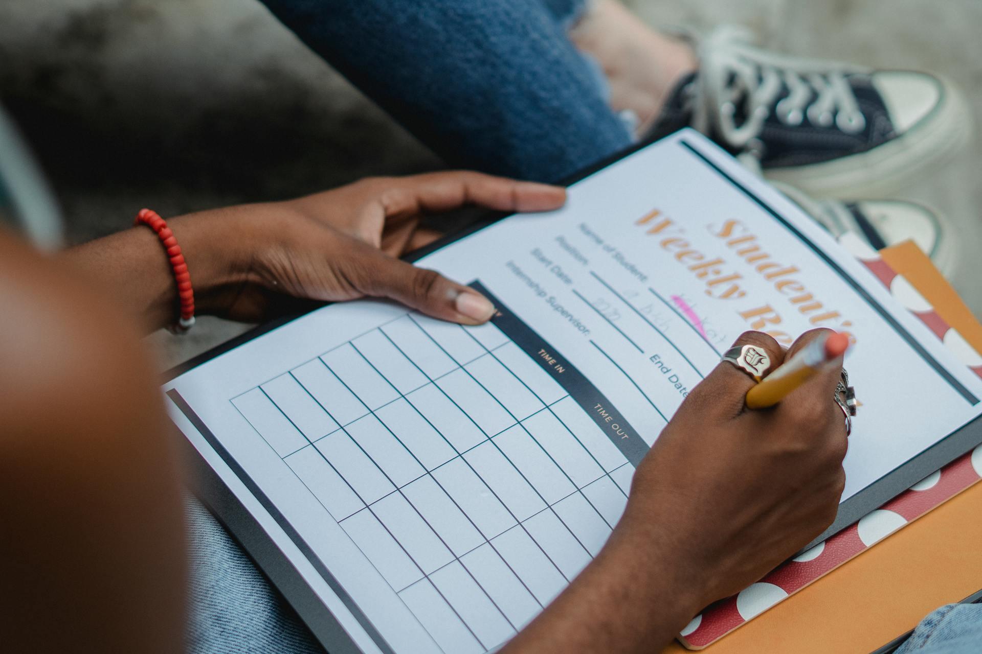 a student filling in a weekly review form