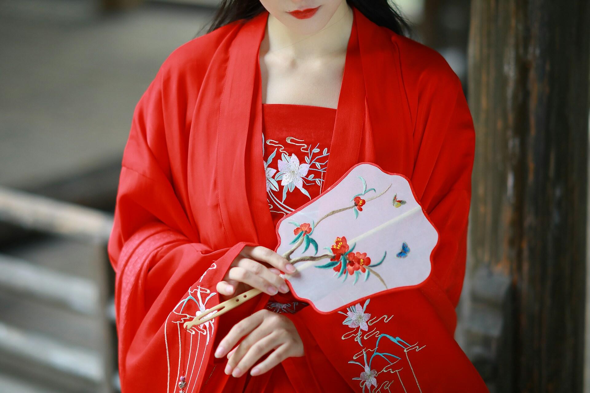 A woman wearing red Hanfu.