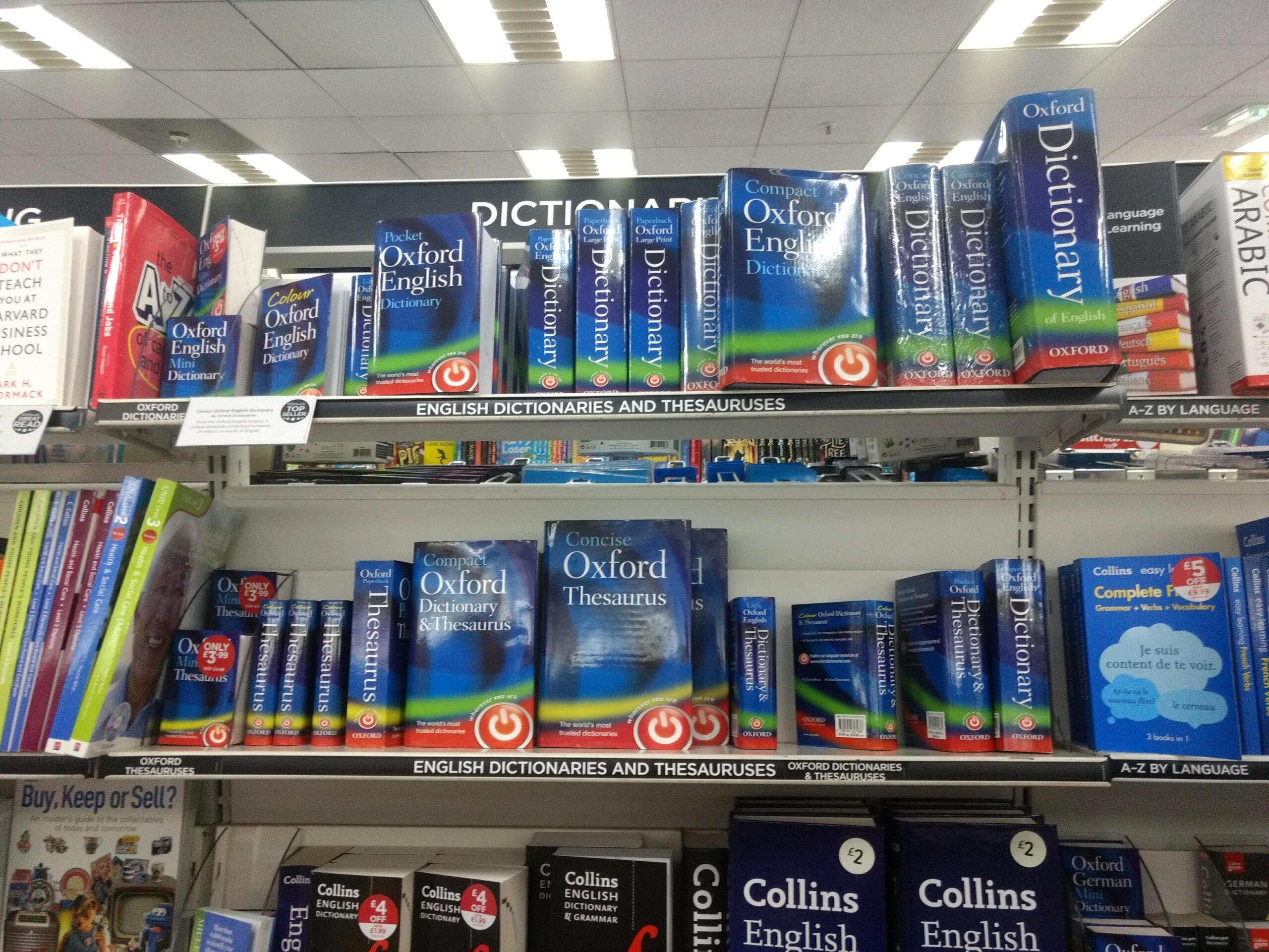 A shelf displaying various Oxford English dictionaries and thesauruses.
