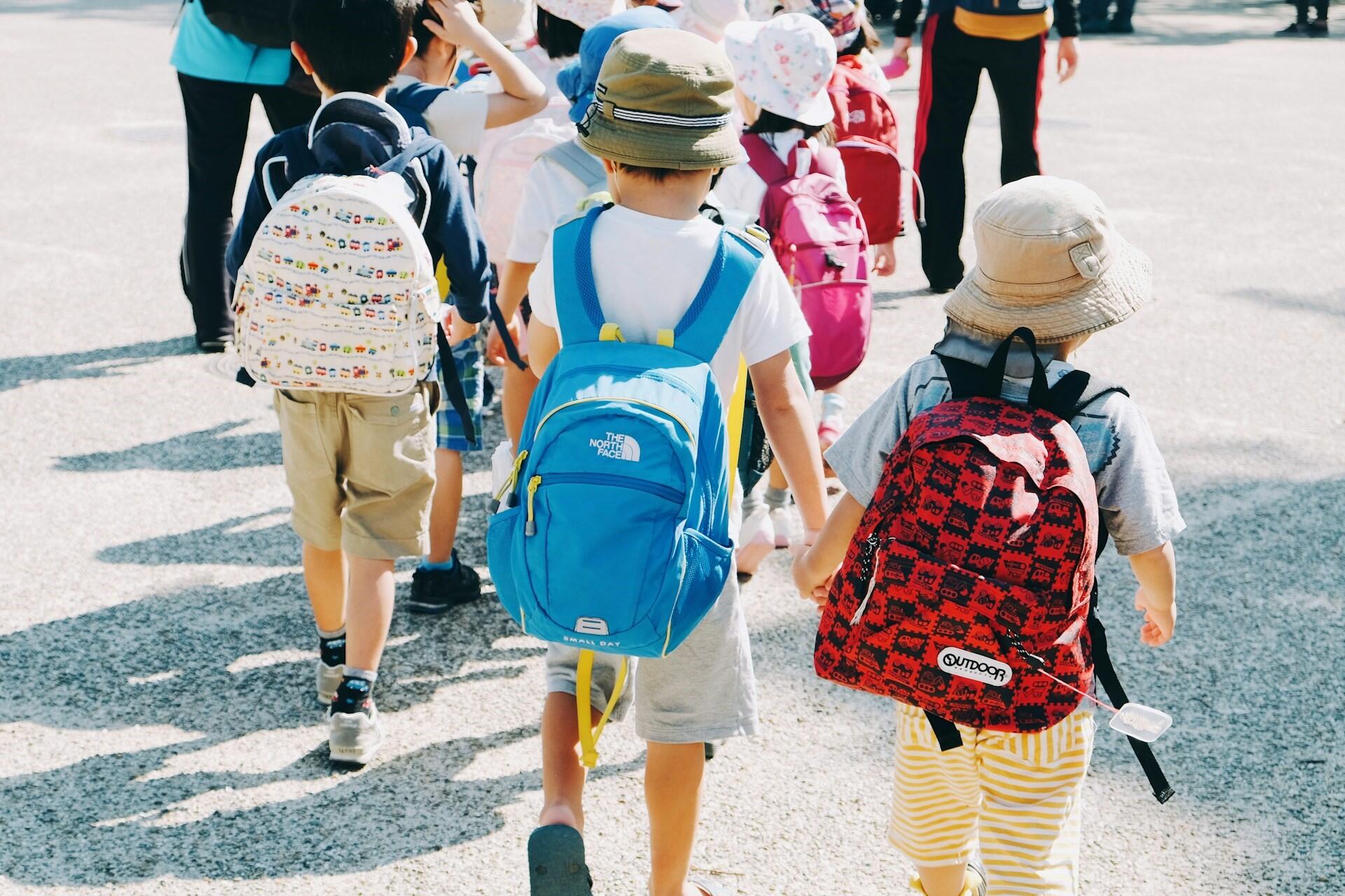 Young children going to school.