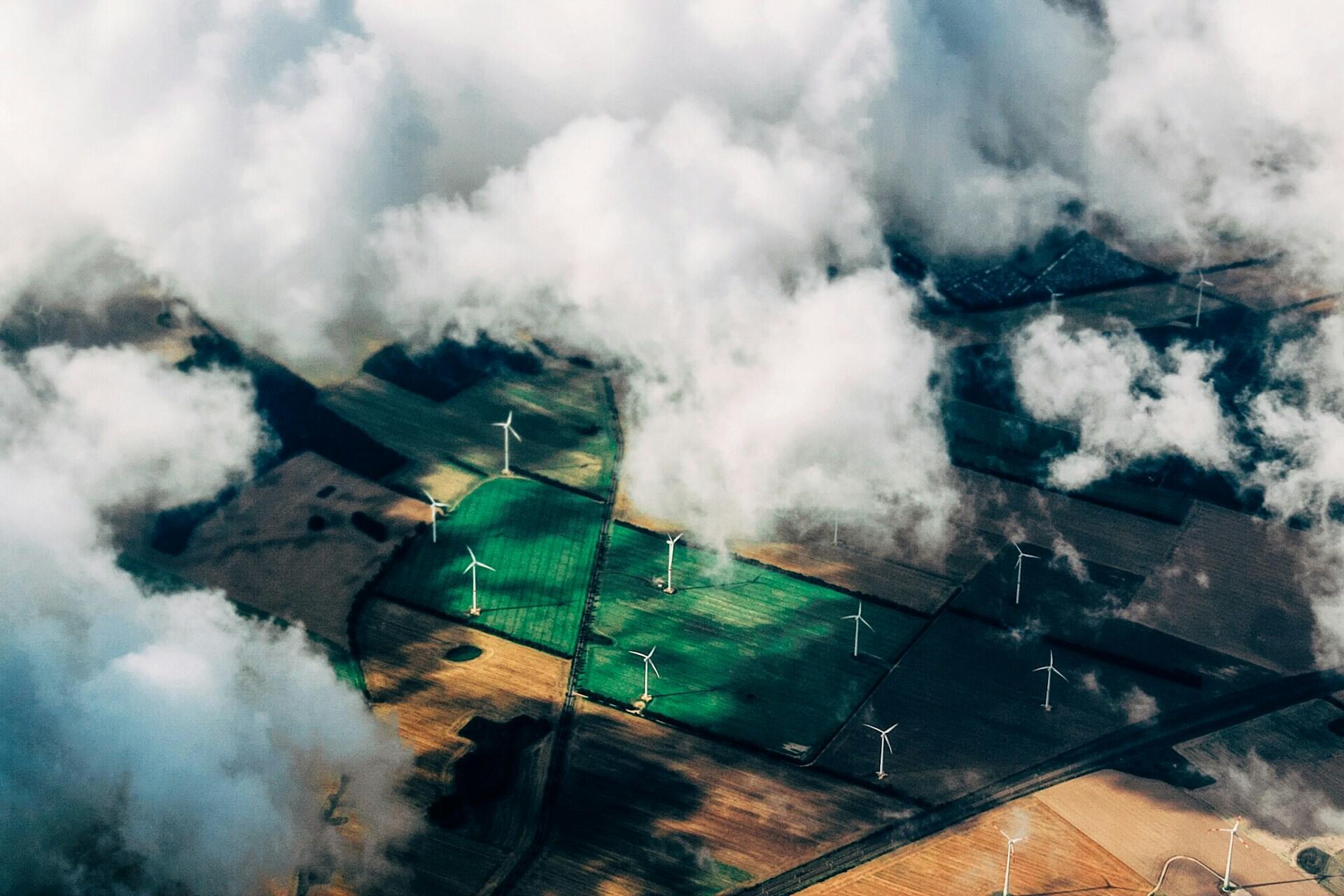A view of wind turbines from the sky.