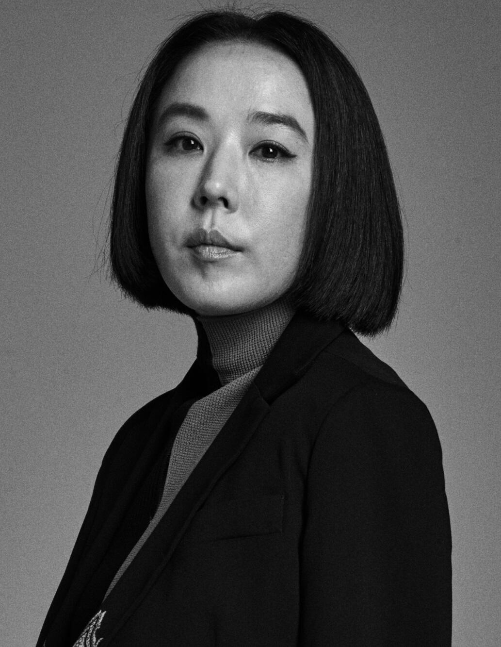 recent black and white photo of Kang Soo-yeon