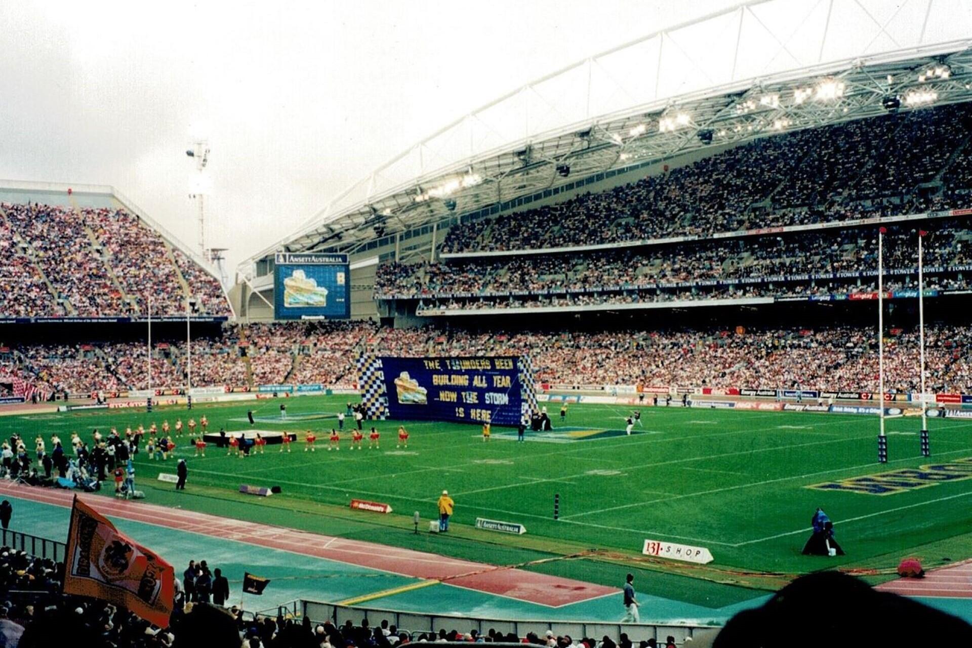 Crowd and teams at the 1999 NRL Grand Final at Stadium Australia in Sydney