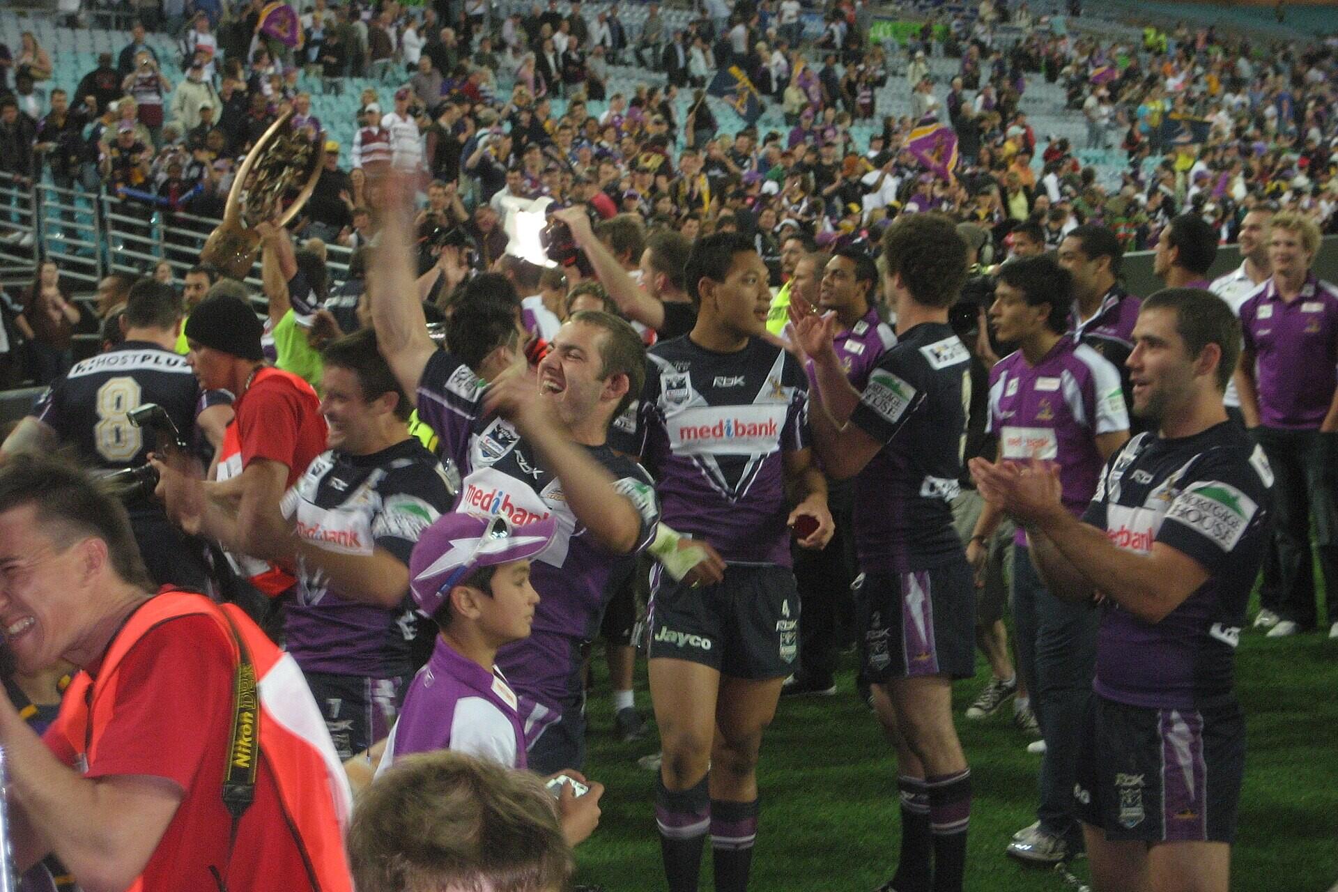 Melbourne Storm players celebrating after a finals match victory