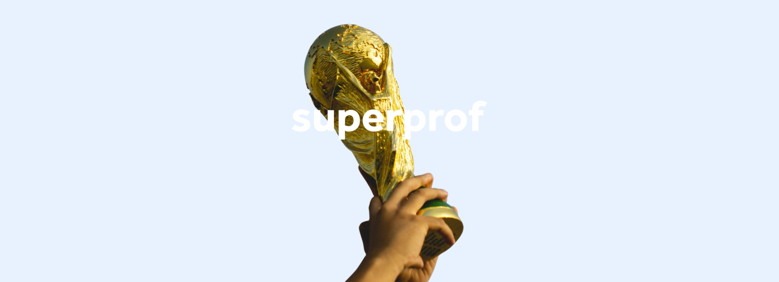 Hand holding up a golden FIFA World Cup trophy against a light blue background with the word 