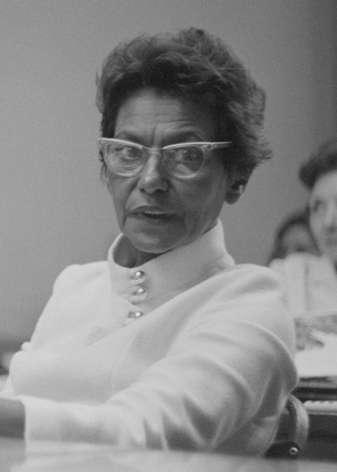 black and white photo of Oodgeroo Noonuccal in a classroom