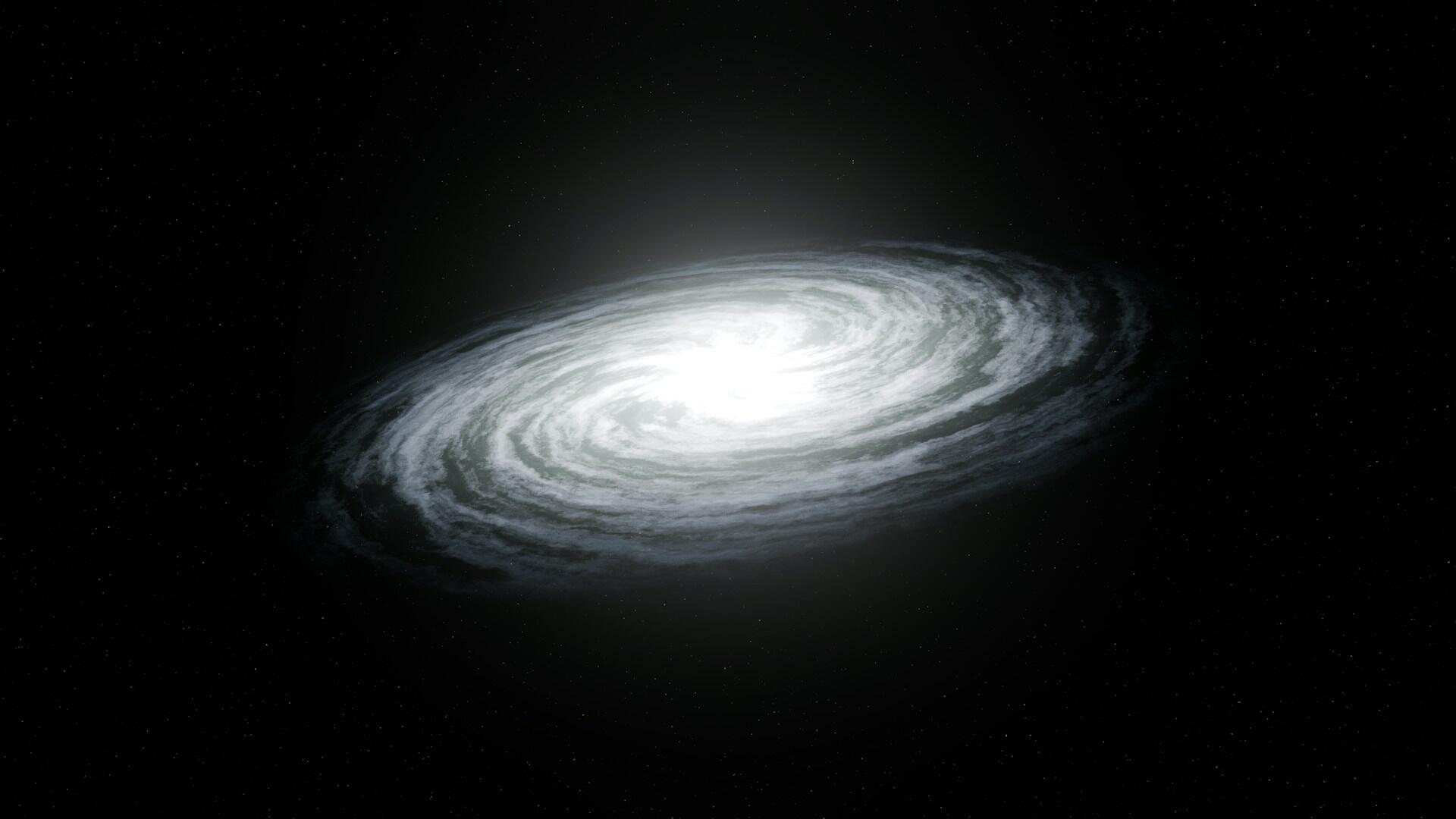 A luminous spiral galaxy illuminated against a black starry background.