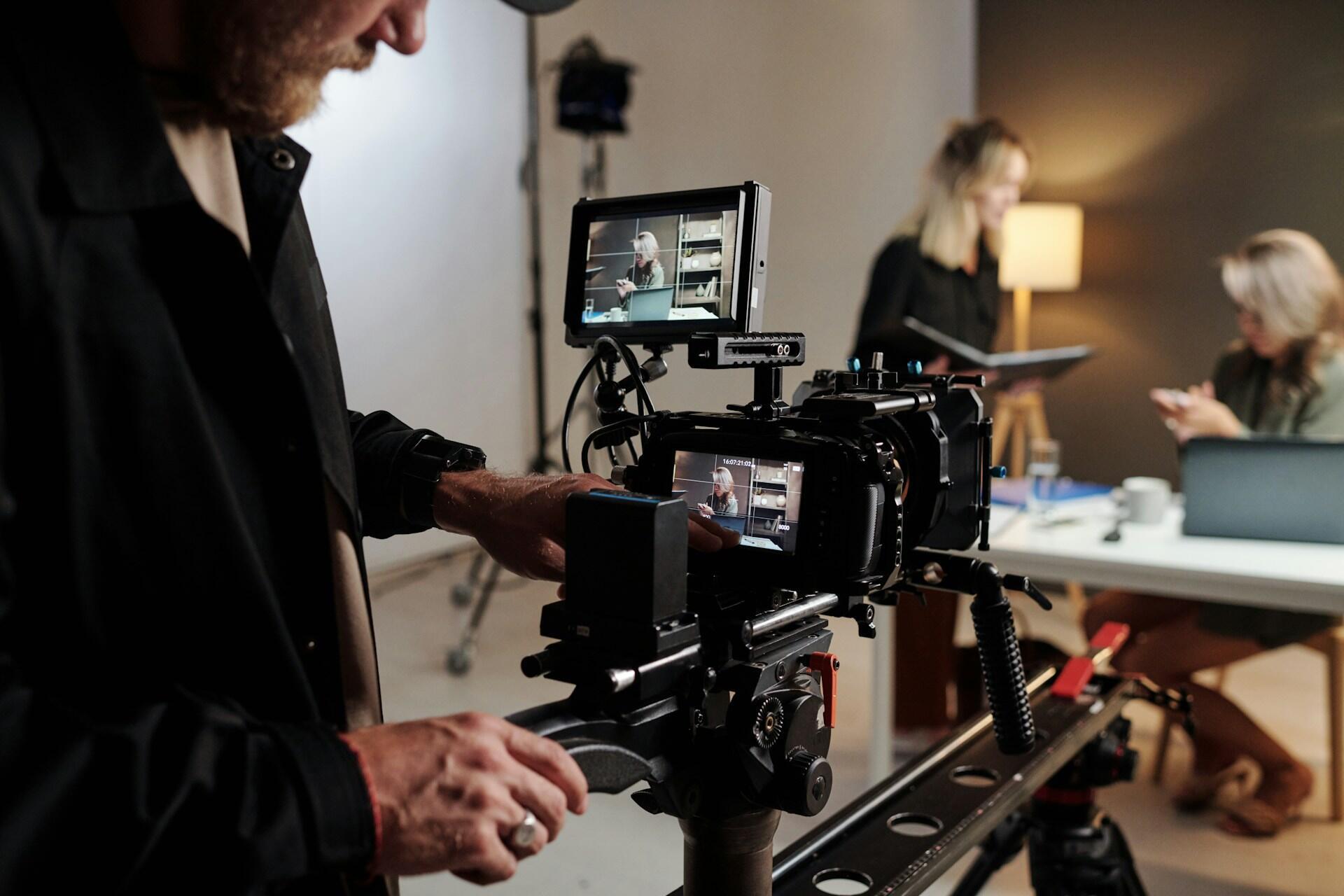Cameraworker filming a scene being acted out