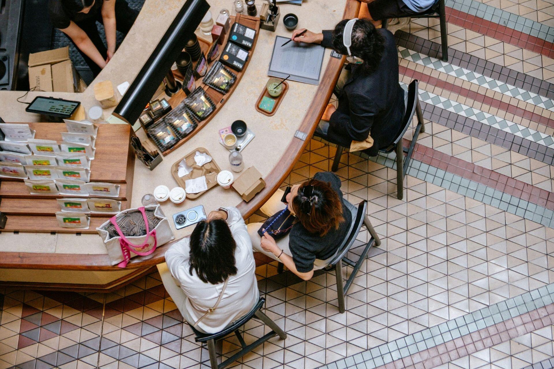 People socialising in a café in Sydney, Australia