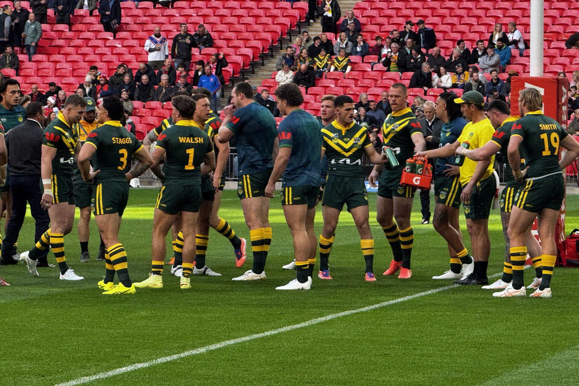Australia national rugby league players warming up at Wembley in 2025