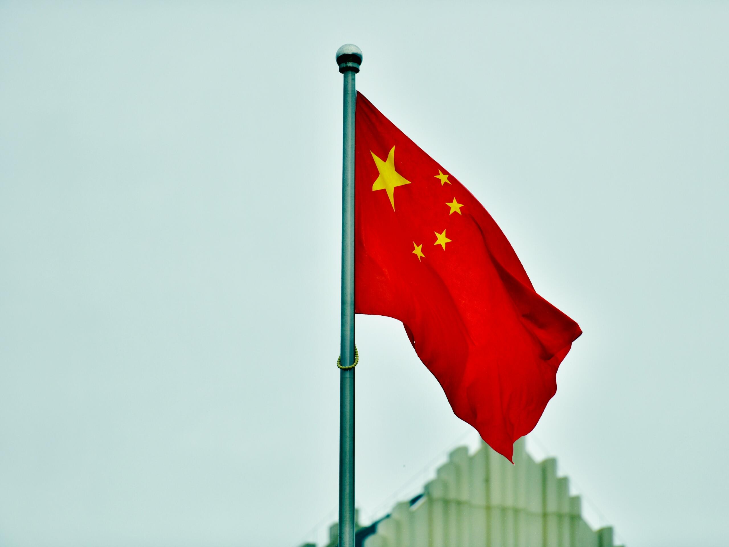 Flag of China waving against the sky