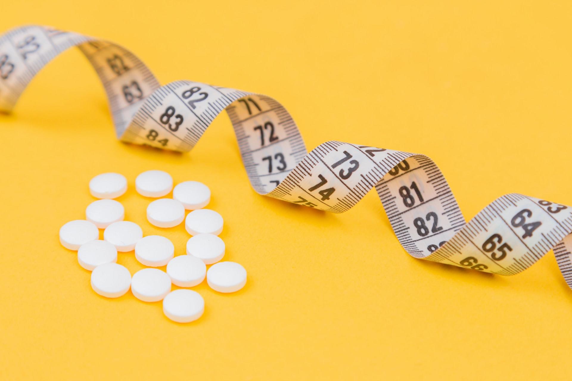 mesure de la taille en centimètres avec gélules