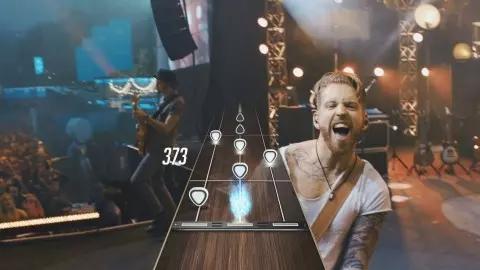 Com Guitar Hero, você toca guitarra e um público reage a sua performance
