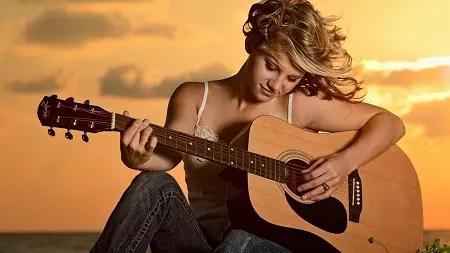 quanto ganha uma mulher guitarrista