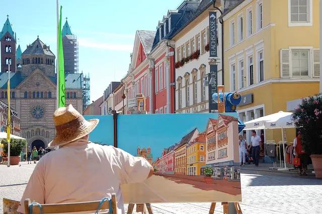 Um dia esse pintor no meio da praça pode ser você!