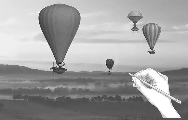 Ilustração de uma mão humana que desenha balões.