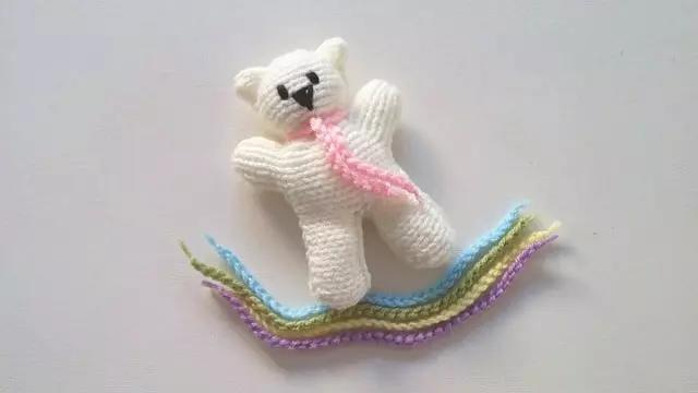 Esse é um boneco de bordar.