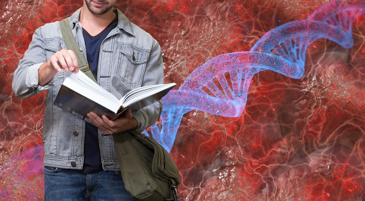 Um estudante lendo um livro com uma imagem de DNA atrás