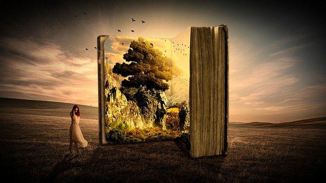Livro aberto com floresta e mulher.