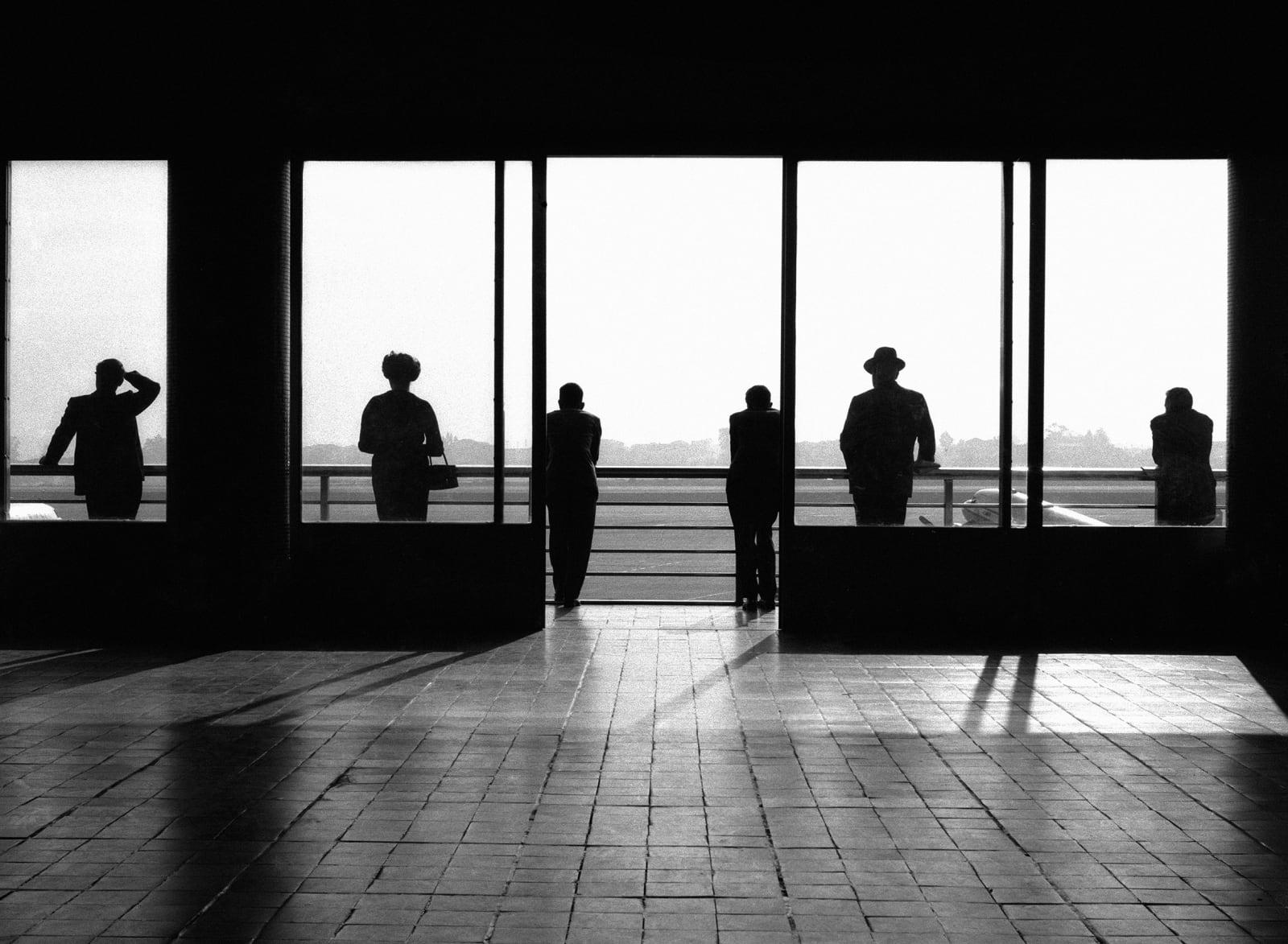 Pessoas no aeroporto de São Paulo.