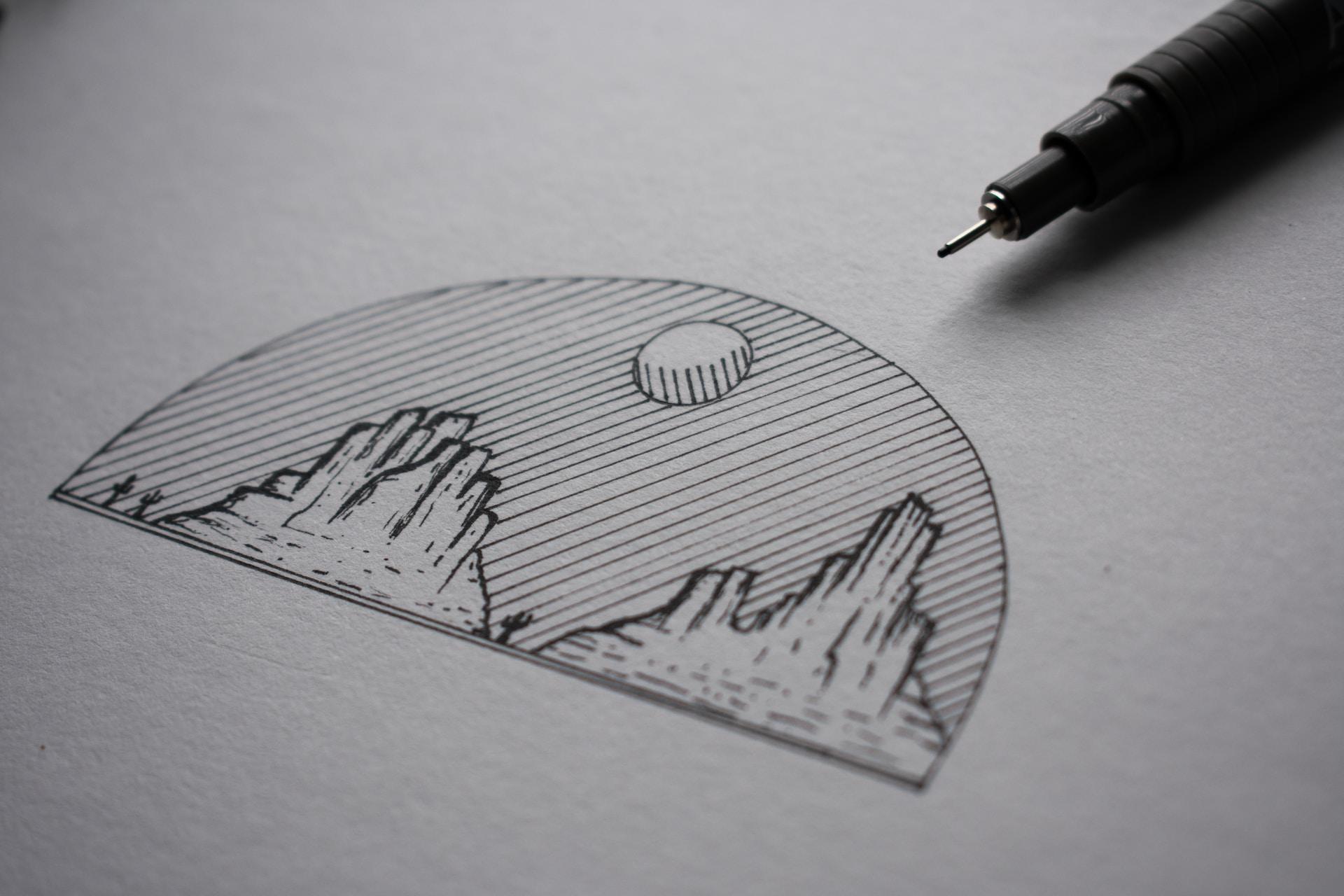 Desenho com caneta preta de umas montanhas rochosas.