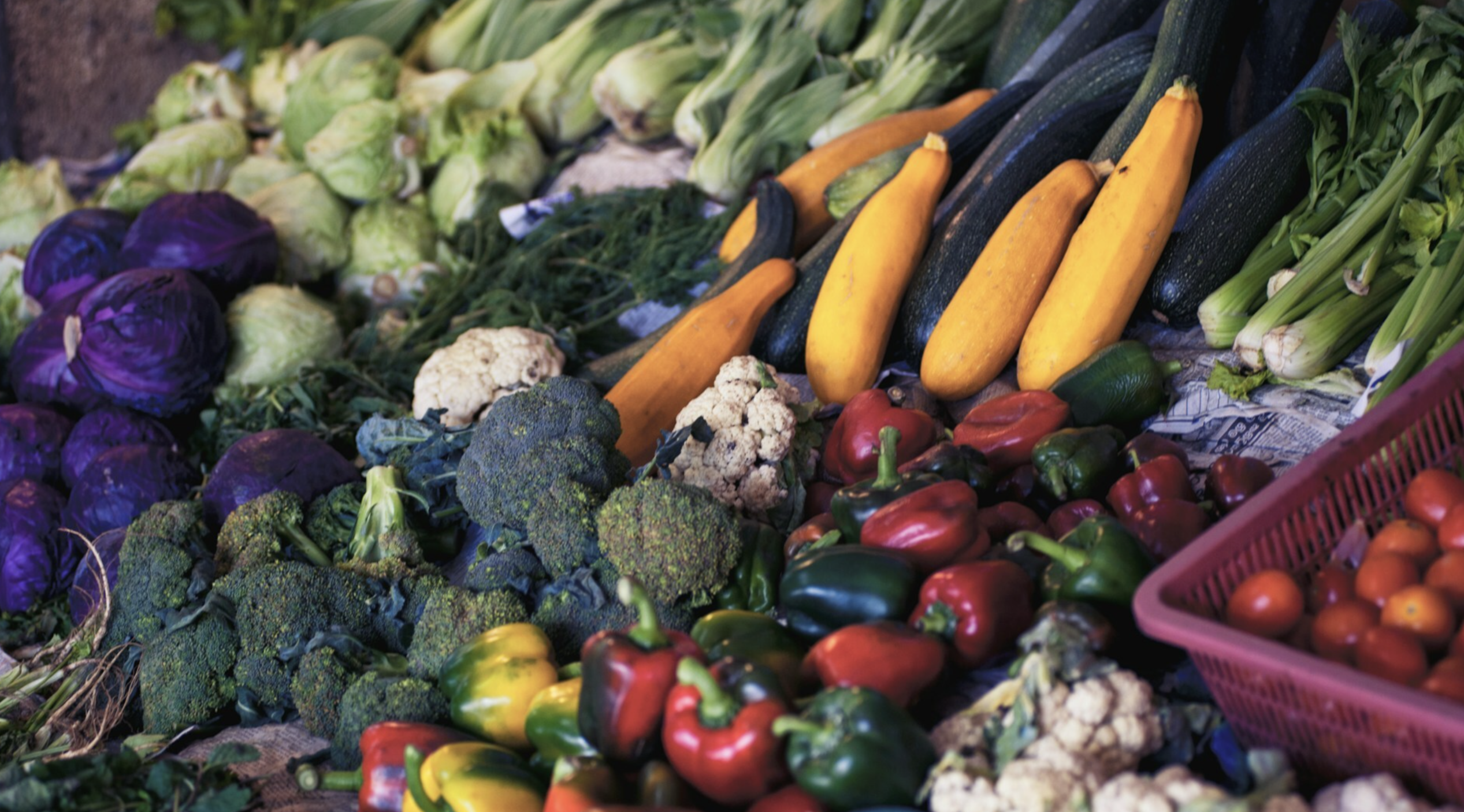 A selection of different fruits and vegetables laid out