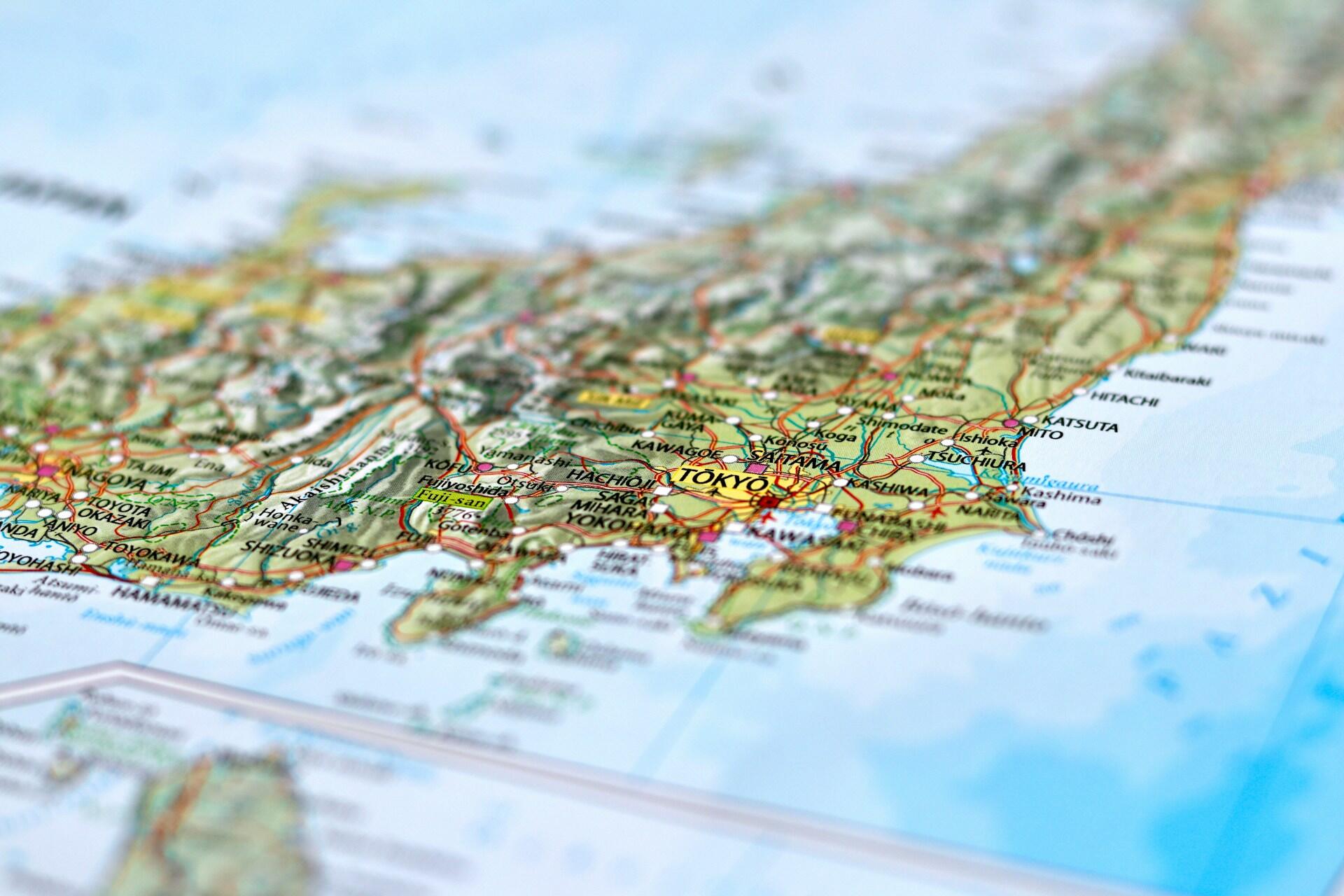 Close-up of a detailed map showing Tokyo and surrounding areas in Japan with nearby cities and geographical features.
