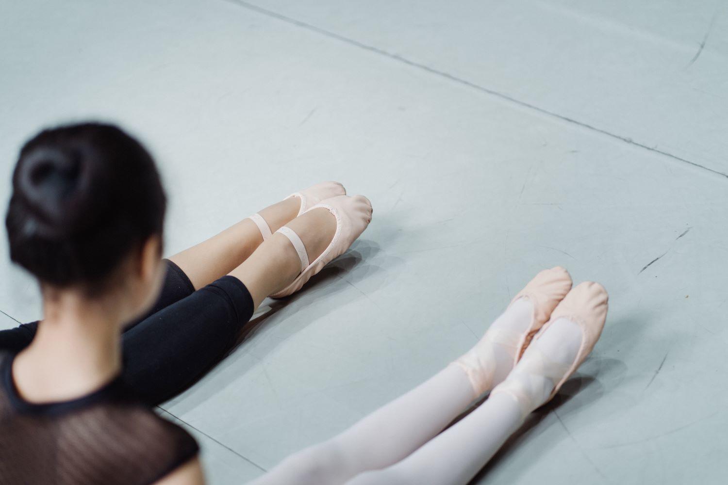 A kid wearing dancing shoes