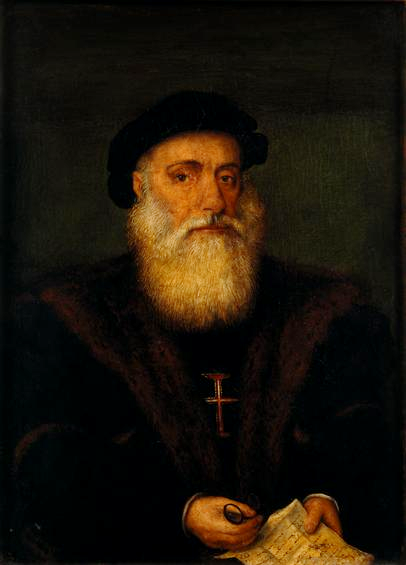 A classical portrait painting of an older man with a long white beard, dressed in dark robes with fur trim. He wears a black cap and a red cross pendant on his chest. He holds a document or chart in one hand, suggesting his role in exploration or navigation.